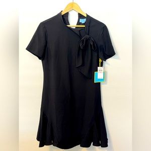 CECE ruffled bottom black dress with bow tie on the neck line. Never worn.